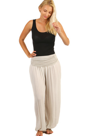 Pohodlné dámské jednobarevné harémové kalhoty. Vhodné na léto. Široká paleta barev. Splývavá tkanina volného