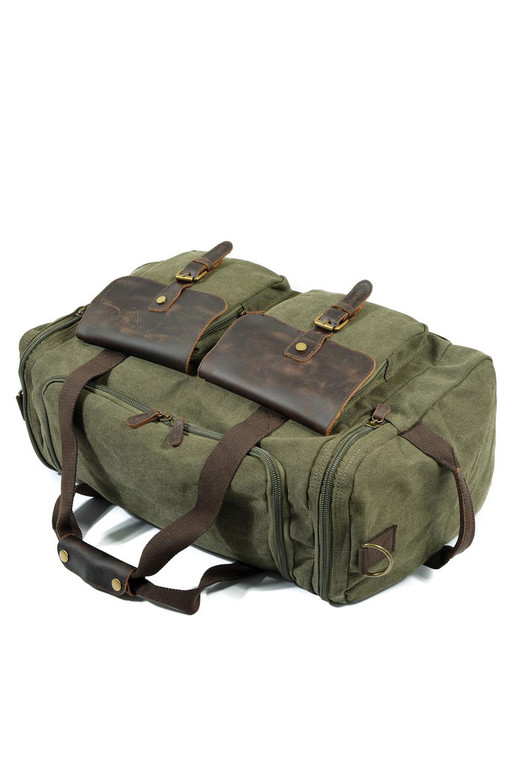 Cestovní taška s koženými detaily