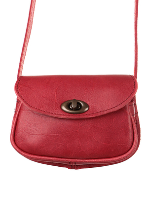Elegantní dámská malá kabelka se zaoblenými tvary, ušitá z pravé hovězí kůže. Má libivé retro zapínání na
