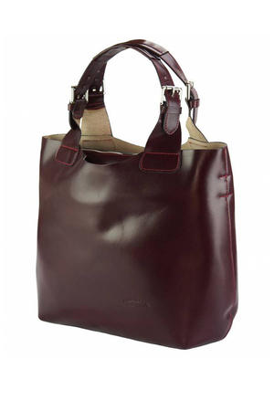 Dámská kabelka z pravé kůže v nadčasovém designu pro aktivní ženu. Taška má nastavitelné ucho a univerzální