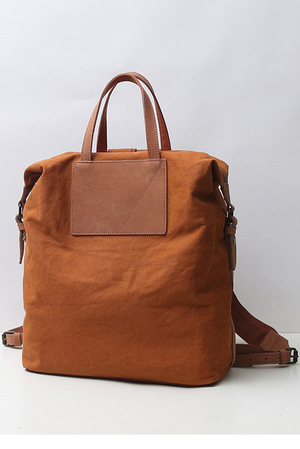 Minimalistický plátěný studentský batoh nebo taška pro každého. Jednobarevný stylový batoh s koženými detaily,