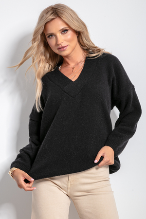 Dámský svetr ze 100% vlny v jednobarevném provedení by neměl chybět ani ve Vašem šatníku. Krátký, hladký svetr